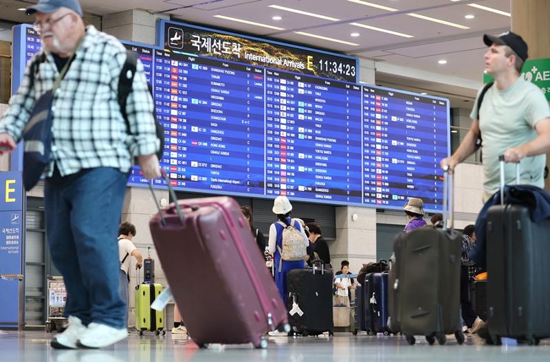 Le terminal 1 de l’aéroport international d’Incheon bondé de voyageurs, le 8 juillet 2026. © Agence de presse Yonhap